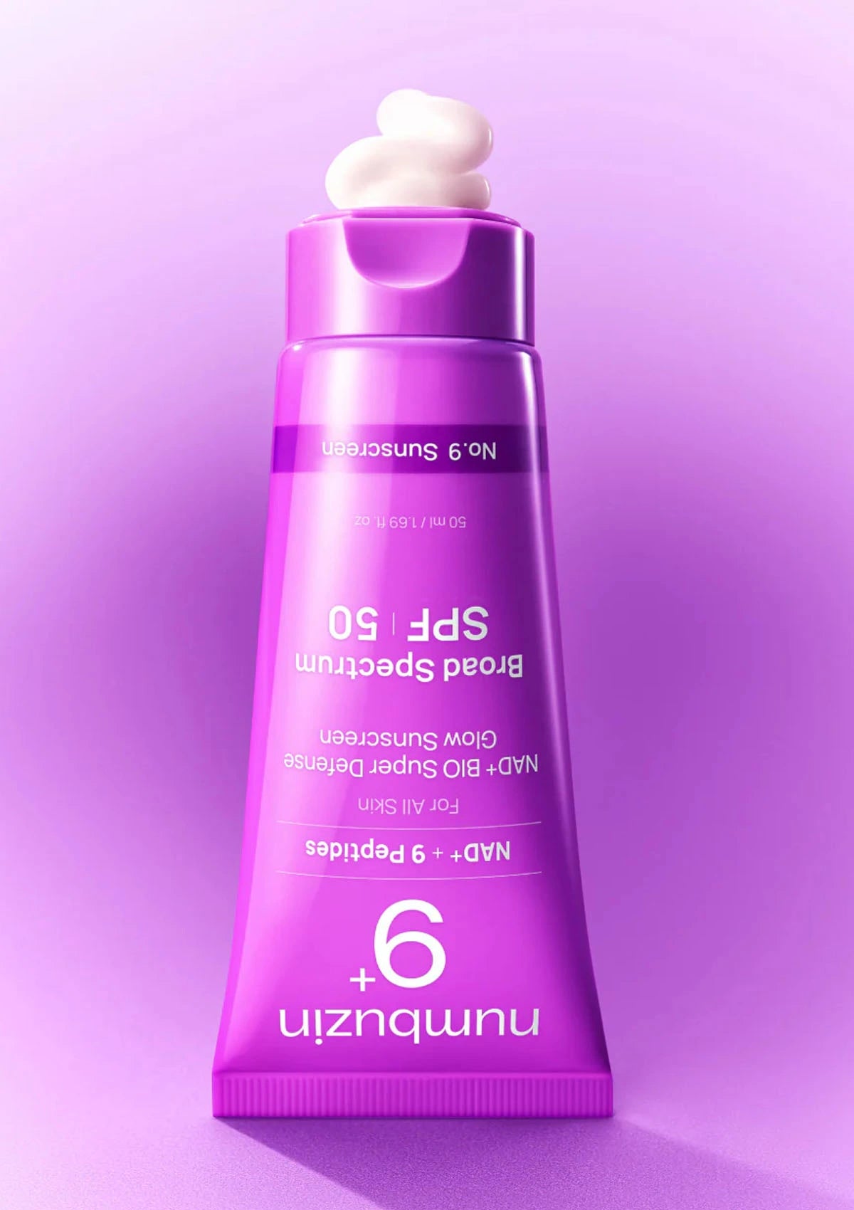 Purple skincare product with white cream on a purple background